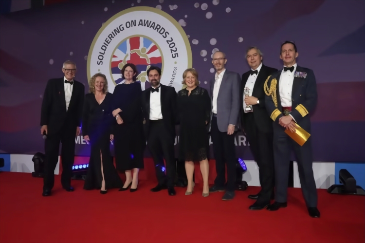 Combat Stress accepting the Soldiering On Award